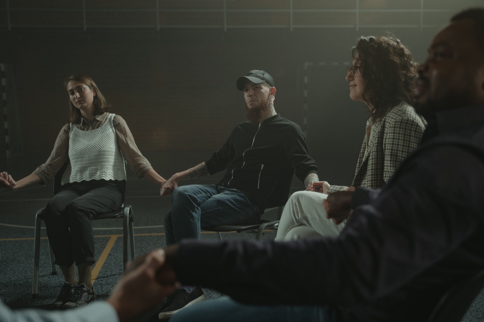 Support group holding hands